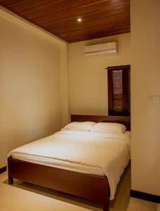 Katil atau katil-katil dalam bilik di Eternal Bliss Estates