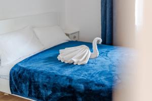 Letto o letti in una camera di Feniks Seaside Apartment with Pool & near Beach