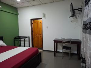 Postel nebo postele na pokoji v ubytování J City Villa