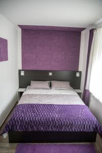 Кровать или кровати в номере Sobe Novi grad