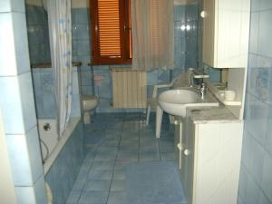 Koupelna v ubytování B&B La Mimosa + 10 fotografií