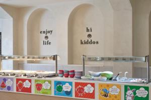 a kitchen with a counter with food on it at Atlantica Aeneas Resort in Ayia Napa