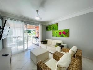 Et tv og/eller underholdning på Brisa do mar Riviera de São Lourenço