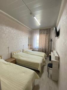 Postel nebo postele na pokoji v ubytování Ayan Resort Hotel