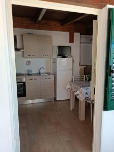 Η κουζίνα ή μικρή κουζίνα στο Casa Vacanza Tramontana