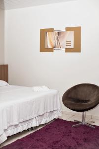 Postel nebo postele na pokoji v ubytování Hotel Açaí