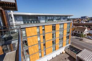 an overhead view of a building on a city street at Mojo - Modern Apartment with Balcony in Poole