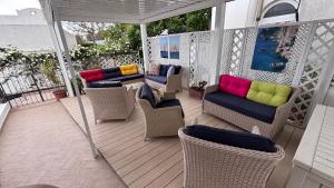 Posezení v ubytování Capri Bougainville Luxury Boutique Hotel