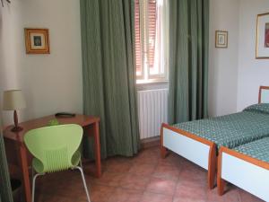 Cama o camas de una habitación en Affittacamere Villa Delia