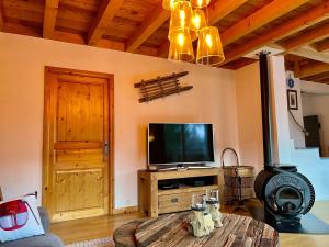 Μια τηλεόραση ή/και κέντρο ψυχαγωγίας στο Chalet Serre Chevalier 160m2 9 pers - Sauna, 5 chambres