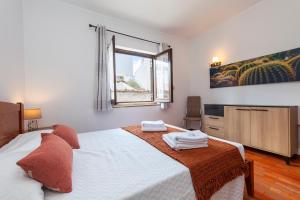 Postel nebo postele na pokoji v ubytování Seacliff Albufeira