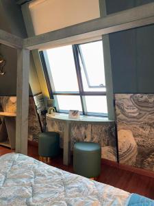 En eller flere senge i et værelse på Safina Style Luxury Ocean View Stay