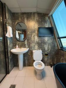 Et badeværelse på Safina Style Luxury Ocean View Stay