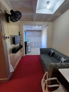 TV a/nebo společenská místnost v ubytování La Casa Hotel - Nyali
