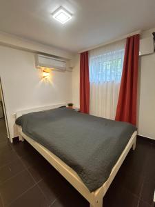 Posteľ alebo postele v izbe v ubytovaní Caesar Apartments & Rooms