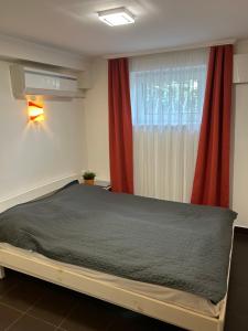 Posteľ alebo postele v izbe v ubytovaní Caesar Apartments & Rooms