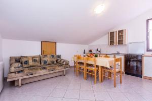 Kuchyň nebo kuchyňský kout v ubytování Apartments Winny