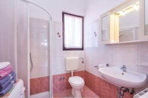 Koupelna v ubytování Apartments Winny