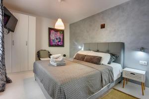 Łóżko lub łóżka w pokoju w obiekcie Holiday Home Zoya