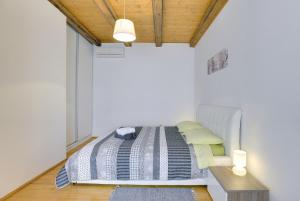 Postel nebo postele na pokoji v ubytování Holiday Home Batelani