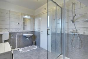 Ein Badezimmer in der Unterkunft Holiday Home Baldini