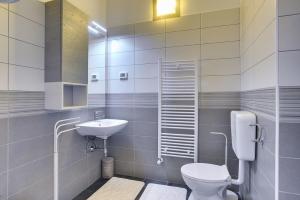 Ein Badezimmer in der Unterkunft Holiday Home Baldini