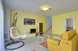 Ein Sitzbereich in der Unterkunft Holiday Home Baldini