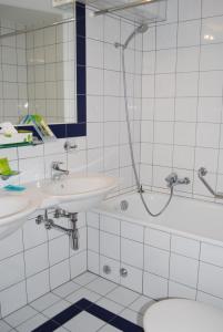 Koupelna v ubytování Hotel du Pigne
