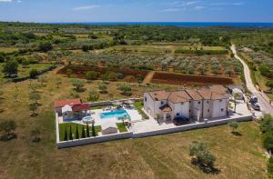 an aerial view of a house with a swimming pool at Villa Paradiso in Rovinj