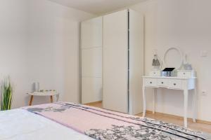 Postel nebo postele na pokoji v ubytování Villa Micol