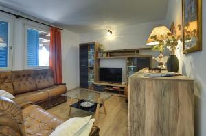 a living room with a couch and a table at Villa Mima in Banjole