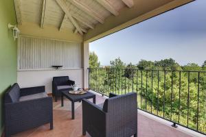 Un balcon sau o terasă la Villa Oliva