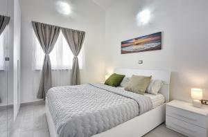 Posteľ alebo postele v izbe v ubytovaní Villa Residence Oli A + 37 fotografií