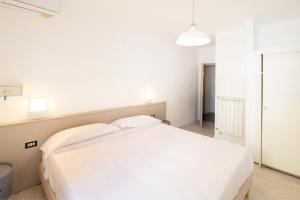 Letto o letti in una camera di Hotel Europa