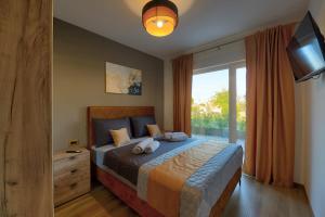 Ένα ή περισσότερα κρεβάτια σε δωμάτιο στο Villa Bavigo +29 φωτογραφίες