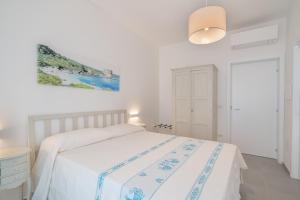 Letto o letti in una camera di B&B S'Unda Jara