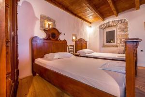 a bedroom with two beds in a room at Villa Teresa in Medulin +58 photos