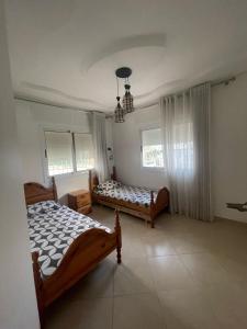 Postel nebo postele na pokoji v ubytování Casa Maraam Chaouen