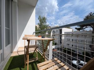 Un balcon sau o terasă la Chic and spacious appartment with balcony