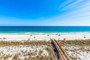 a view of the beach with a train on the sand at The Edgewater 44 in Gulf Shores