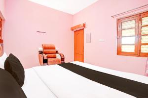 Postel nebo postele na pokoji v ubytování OYO 8195 Marine Guest House