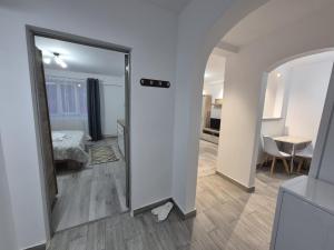 Postel nebo postele na pokoji v ubytování TRB Apartment