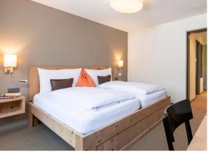 Łóżko lub łóżka w pokoju w obiekcie Hotel Donatz