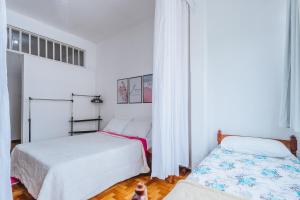 Postel nebo postele na pokoji v ubytování Apto confortavel, otima localizacao e pet friendly