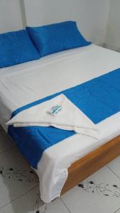 Postel nebo postele na pokoji v ubytování Casa Vacanze Cenaida Tucán