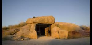 an entrance to a cave in the desert at Casa Campanilla Valle De Abdalajis in Valle de Abdalagís