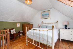 Ένα ή περισσότερα κρεβάτια σε δωμάτιο στο Cosy 1-Bedroom Cottage Retreat in Charming Elloughton