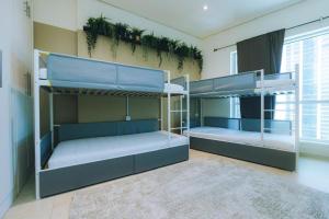 Ένα ή περισσότερα κρεβάτια σε δωμάτιο στο Marina Mirage