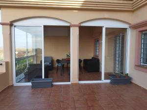 Posezení v ubytování El Mirador del Coto, Apartamentos Living Sur