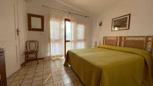 Una cama o camas en una habitación de Le tre Palme